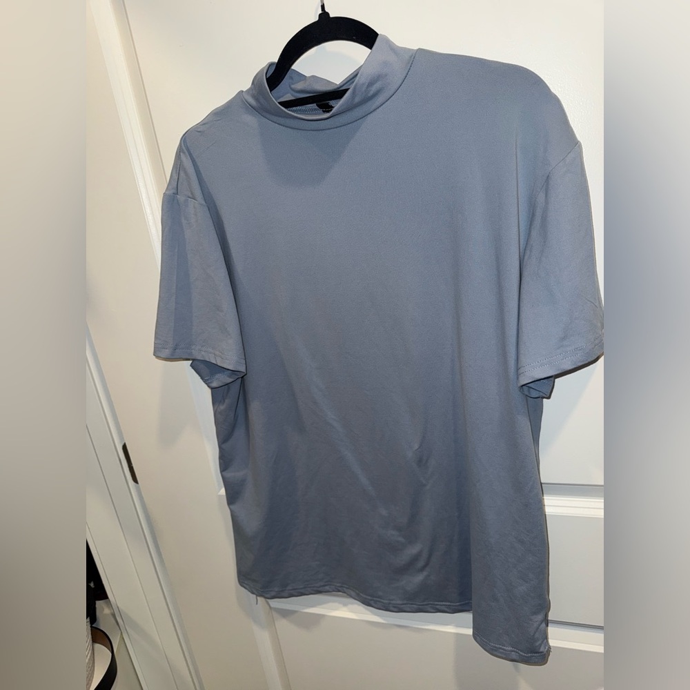Women’s Blue gray top. Mock turtleneck style.